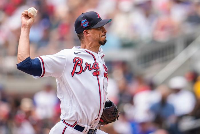 Jun 18, 2023; Cumberland, Georgia, USA; Atlanta Braves starting pitcher Charlie Morton (50) pitches against the Colorado Rockies during the first inning at Truist Park.